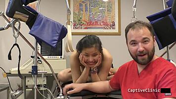 I scream as Raya Nguyen slaps my shaved pussy with latex gloves and toys