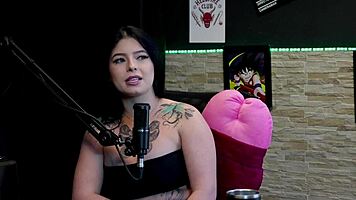 Redhead teen Kalyca shows off in sheer red