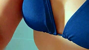 beautiful tanned latina showers after beach