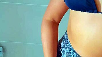 beautiful tanned latina showers after beach