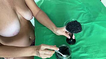 Tell me, how does this mature woman milk her partner's balls?