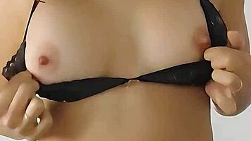 Latina shows big tits and ass in lingerie