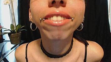 Goth Girl Applies Lipstick and Drools Playfully