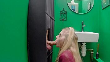 Teen eagerly sucks cock at the gloryhole