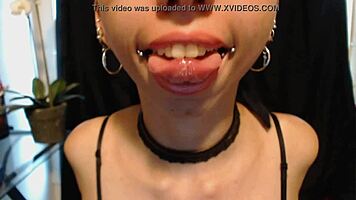 Goth Girl Applies Lipstick and Drools Playfully