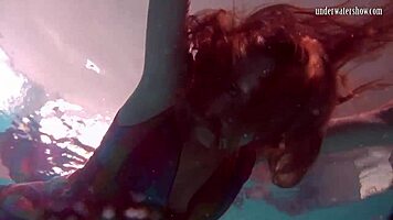 Redhead Nikita Vodorezova Takes A Quick Bath Underwater