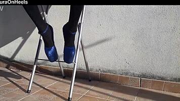 Denim shorts, black tights, and gorgeous heels on adorable milf