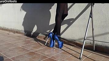 Denim shorts, black tights, and gorgeous heels on adorable milf