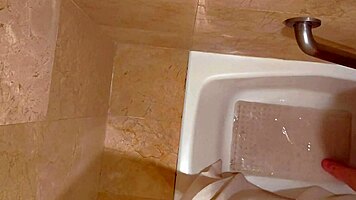 latina babe masturbates wet in bathroom