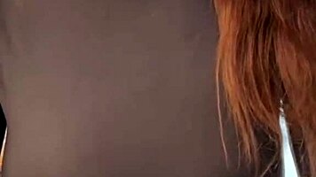 woman caresses her milky tits until she orgasms