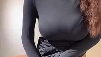 woman caresses her milky tits until she orgasms