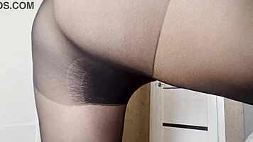 Young woman without panties in transparent pantyhose