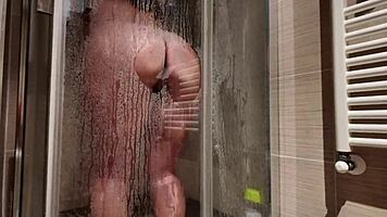 feeling so wet, big breasted milf shaves her hairy pussy in the shower