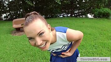 Busty cheerleader flashes tits outdoors!