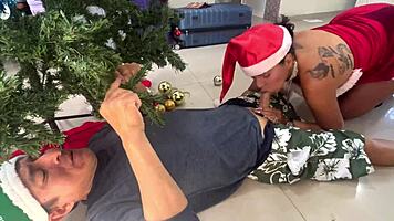 Busty young woman gives new year gift to old man.