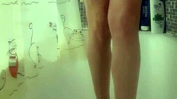 Busty 18+ European Teen Carefully Washes Her Perfect Feet In The Shower, Exposing Big Tits