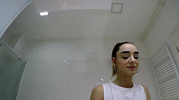 Hot Brunette College Girl With A Mini Tennis Skirt And Over Knee Socks In The Bathroom Shows Panties Under Her Short Skirt And Goes Also No Panties