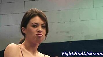 busty babe fingers cute teen after wrestling match in the ring, exploring shaved pussies with licks and fingering