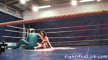 busty babe fingers cute teen after wrestling match in the ring, exploring shaved pussies with licks and fingering