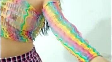 opening her pussy and inserting a pink dildo she shows her wet pussy