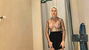 Horny young blonde in fitting room shows big tits and puffy nipples, craving intense fuck.