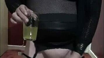 Mark Wright, a bisexual crossdresser, savors ass, piss, and cum flavors in his anal debut.