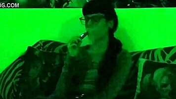 Beth kinky sexy goth domina smoking in green light