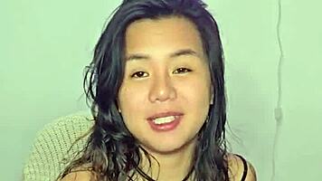 asian teen amateur gets excited by homemade music track