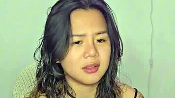 asian teen amateur gets excited by homemade music track