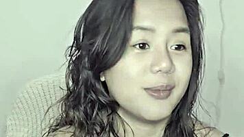 asian teen amateur gets excited by homemade music track