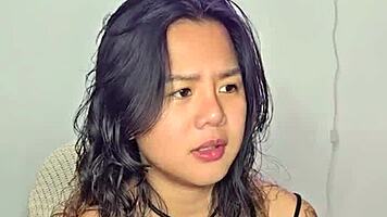 asian teen amateur gets excited by homemade music track