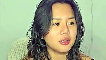 asian teen amateur gets excited by homemade music track