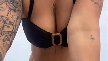 Young african woman in tight yellow bikini at usa beach