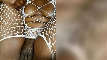 Black ebony woman uses the dildo