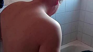 in the bathroom, she gives a passionate blowjob