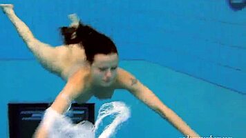 kristy big boob babe splashing in pool underwater
