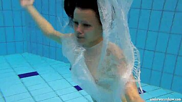 kristy big boob babe splashing in pool underwater