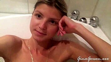 german blonde poses erotically with clothes ripped off