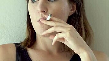 Petite Brunette Teases Smoking with Blue Eyes Voyeur