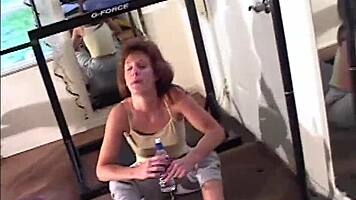 maria shadoes flexes redhead milf curves in gym bts