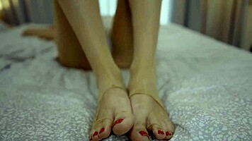 sexy blonde teases feet in nylons craving your hot load