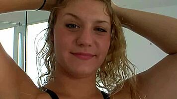 busty curvy amateur poses her natural big tits confidently