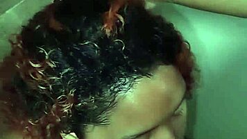 couple shares tender intimate moments in steamy hotel bath