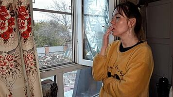 Asian beauty lights up a cigarette in intriguing fetish moment