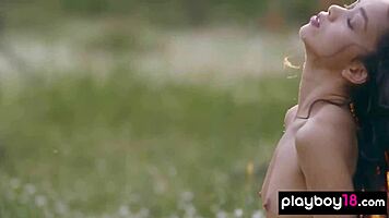 petite filipina kit rysha strips nude in wildflower field