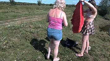 Mature Babe and Young Hottie Naked Sunbathing Public Beach