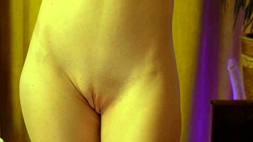 blonde beauty dances in strawberry panties hugging her round ass