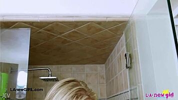 Radiant Blonde Enjoys Refreshing Shower Moment