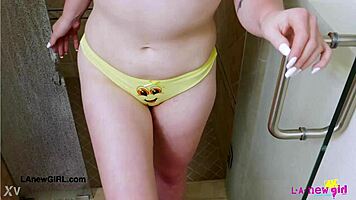 Radiant Blonde Enjoys Refreshing Shower Moment