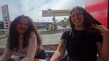 Latina licks sexy pussy in lingerie during mountain car bath fun